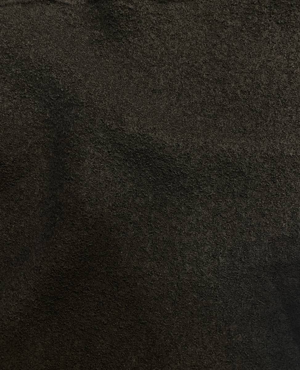 Mosott fekete kabátszövet