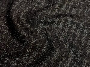 Fekete enyhén fényes, aprómintás Chanel szövet