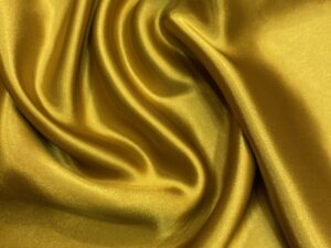 Ragyogó aranysárga viszkóz–acetát szatén