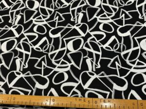 Grafikus fekete–fehér mintás elasztikus jacquard brokát
