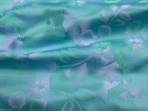 Türkiz–menta virágmintás olasz jacquard szövet